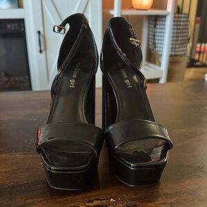 Madden Girl Women’s Omega Black Platform Heels